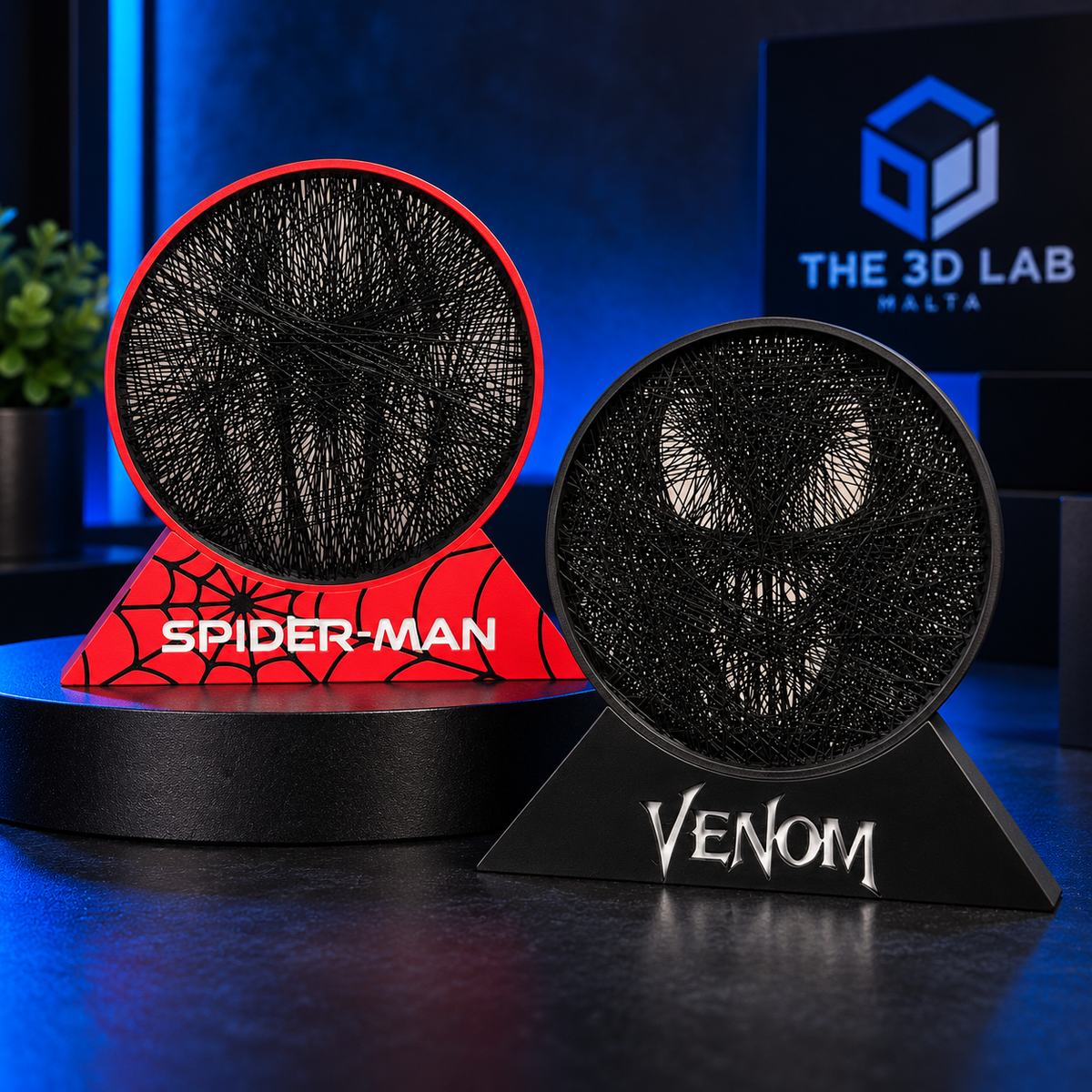 Two comic-inspired circular string-art displays on red and black stands