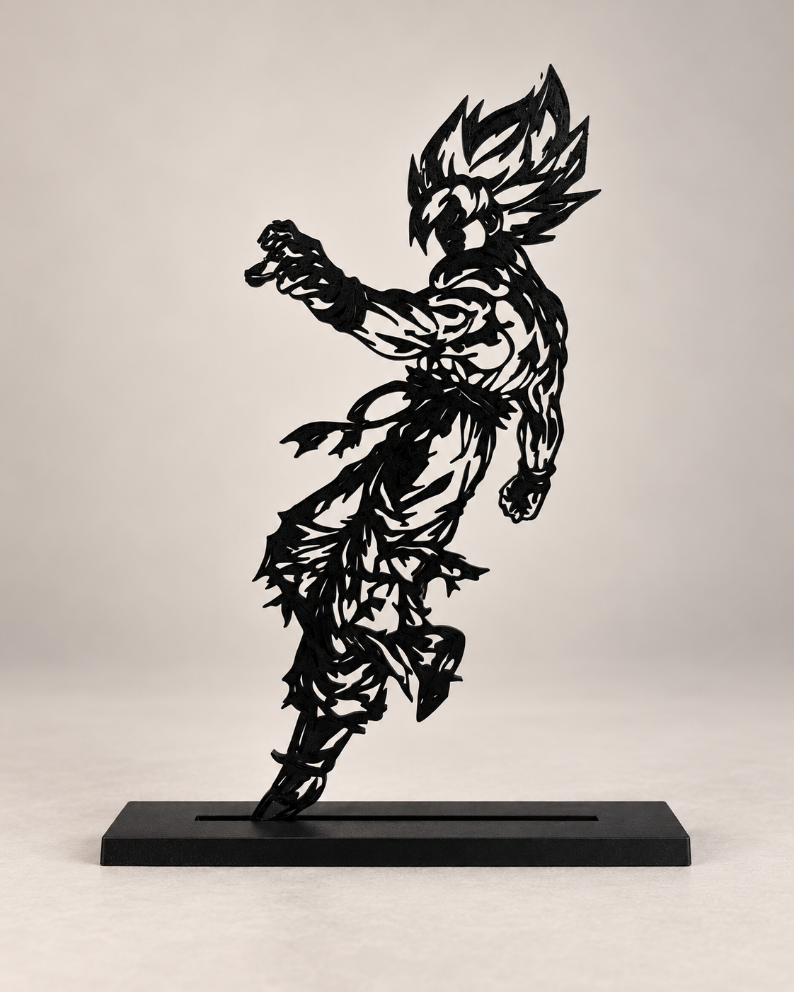 Super Saiyan – black line-art display on light studio background