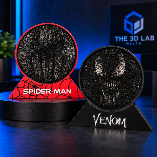 Two comic-inspired circular string-art displays on red and black stands